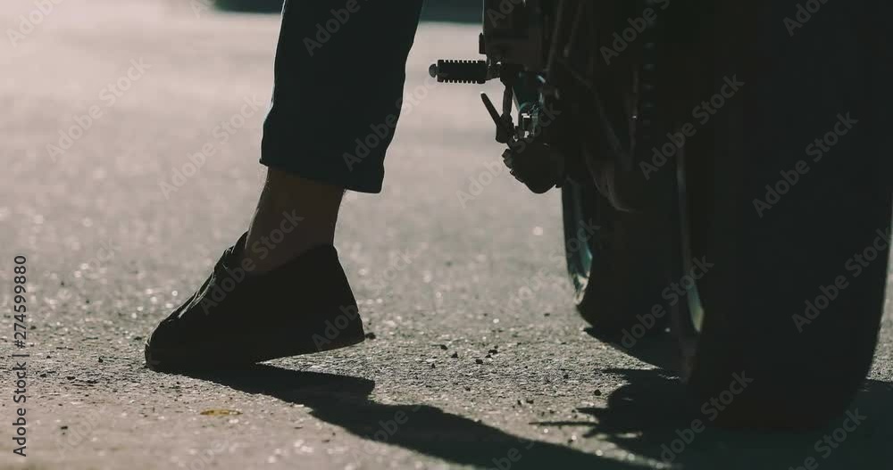 The courier on a motorcycle stopped The courier on a motorcycle stopped