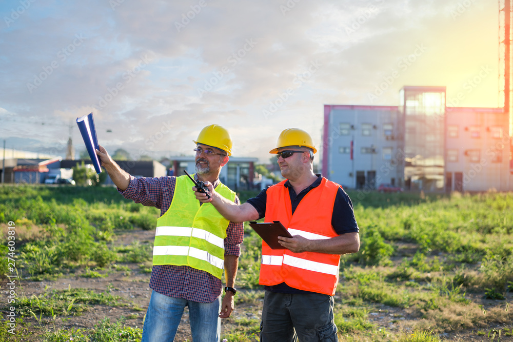 Engineers,workers at industrial facility Engineers,workers at industrial facility