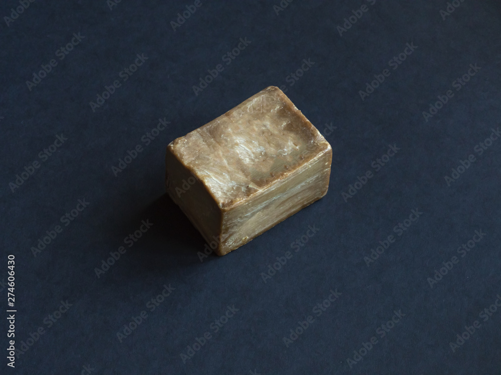 Olive oil soap handmade on a black background. Olive oil soap handmade on a black background.