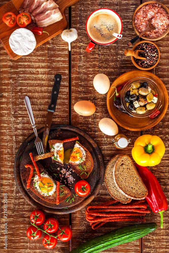 Fried bread with egg and bacon. Hearty meal. Vegetables and fried egg. Healthy breakfast. Fried bread with egg and bacon. Hearty meal. Vegetables and fried egg. Healthy breakfast.