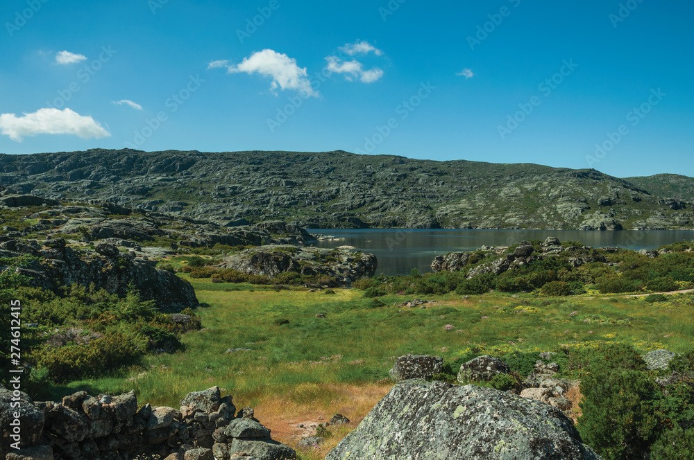 Hilly landscape with the Long Lake on highlands Hilly landscape with the Long Lake on highlands