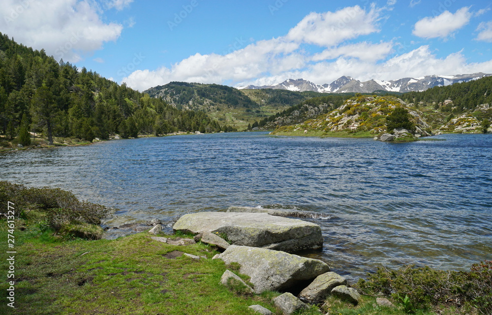 Fototapeta premium France mountain lake with the Carlit massif in background, Pyrenees-Orientales, Estany de la Pradella, natural park of the Catalan Pyrenees