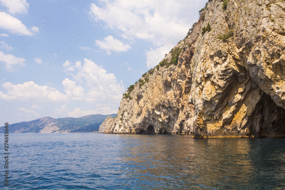 Grotto in the rocks, leaving the sea.West coast of the Black sea.Crimea. Grotto in the rocks, leaving the sea.West coast of the Black sea.Crimea.