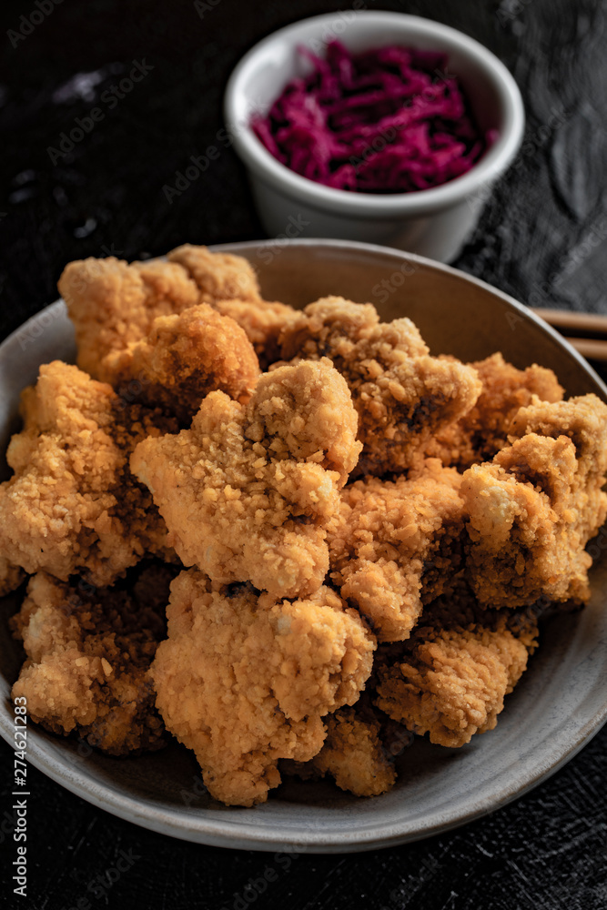 Delicious crispy fried chicken breast strips. Delicious crispy fried chicken breast strips.