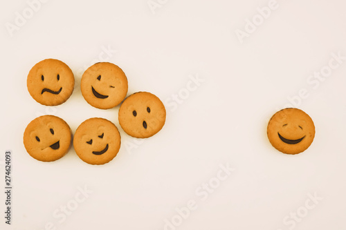 tasty cookies with different emotions on an isolated background