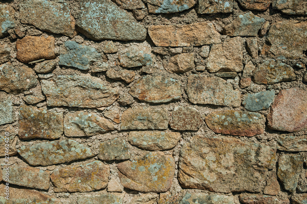 Wall made of stones forming a singular background in Monsanto Wall made of stones forming a singular background in Monsanto