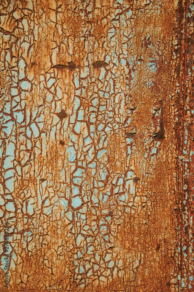 Fototapeta premium Rusted metal with cracks and peeling paint