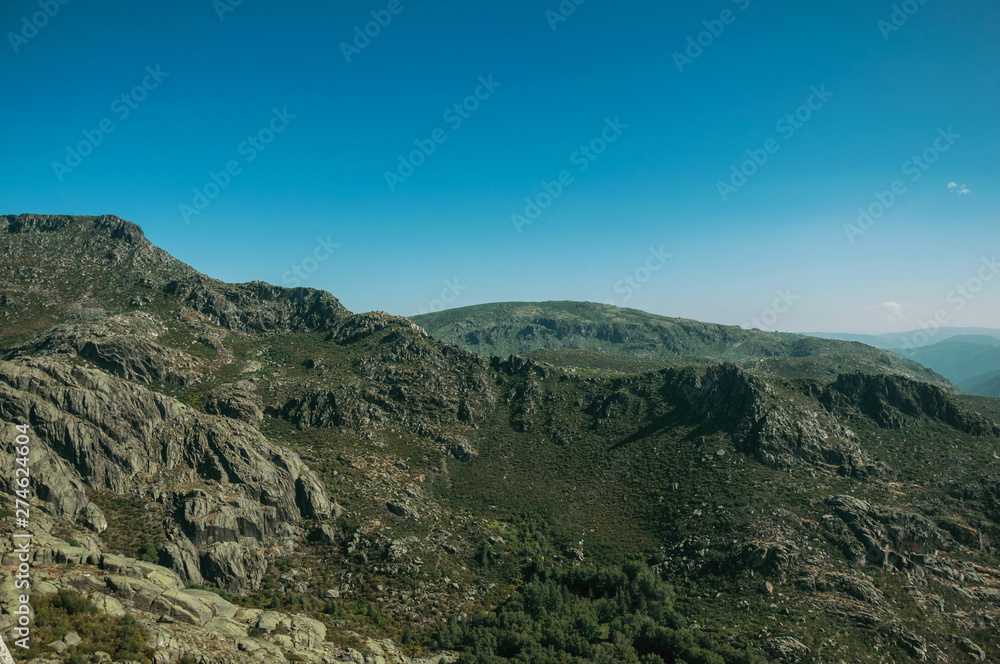 Mountainous landscape with rocky cliffs