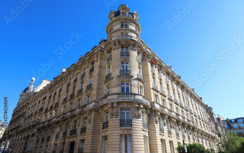 Traditional French house with typical balconies and windows. Paris. © kovalenkovpetr