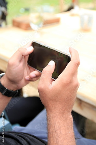 mobile phone with hand new technology stock photo