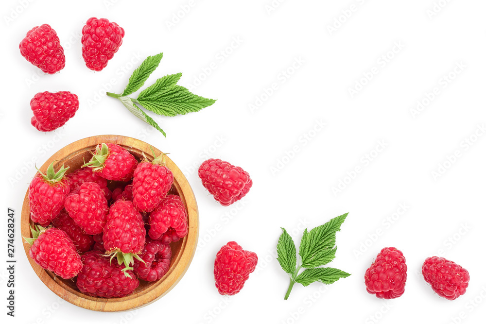 raspberries in wooden bowl with leaves isolated on white background with copy space for your text. Top view. Flat lay pattern raspberries in wooden bowl with leaves isolated on white background with copy space for your text. Top view. Flat lay pattern