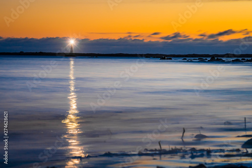 Lighthouse ocean seascape coastline shoreline on Cape Sable Island  Nova Scotia.