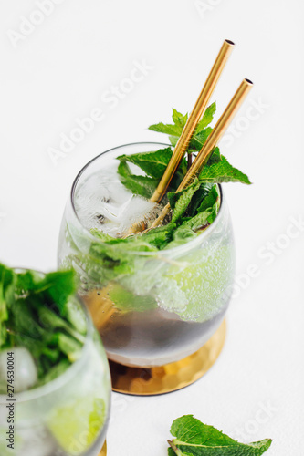 Cocktail with lime, mint and ice. Summer drinks.