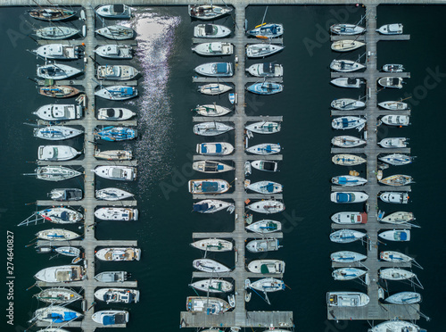 Birds eye view docked boats in marina