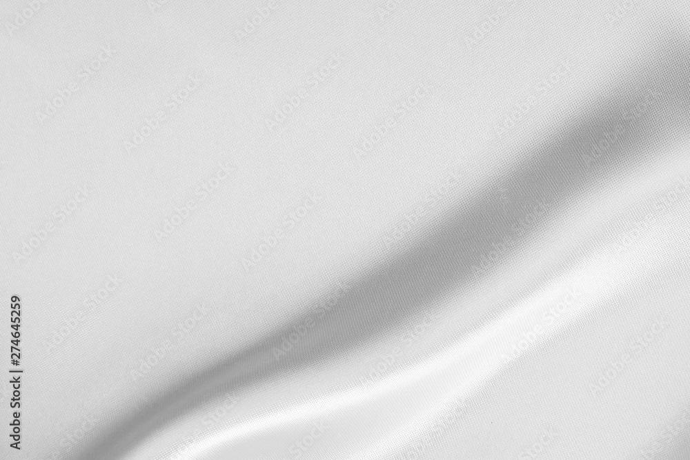 The texture of the satin fabric of white color for the background The texture of the satin fabric of white color for the background