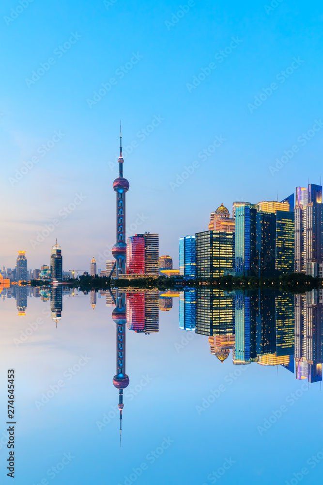 Shanghai skyline with modern urban skyscrapers at sunset,China