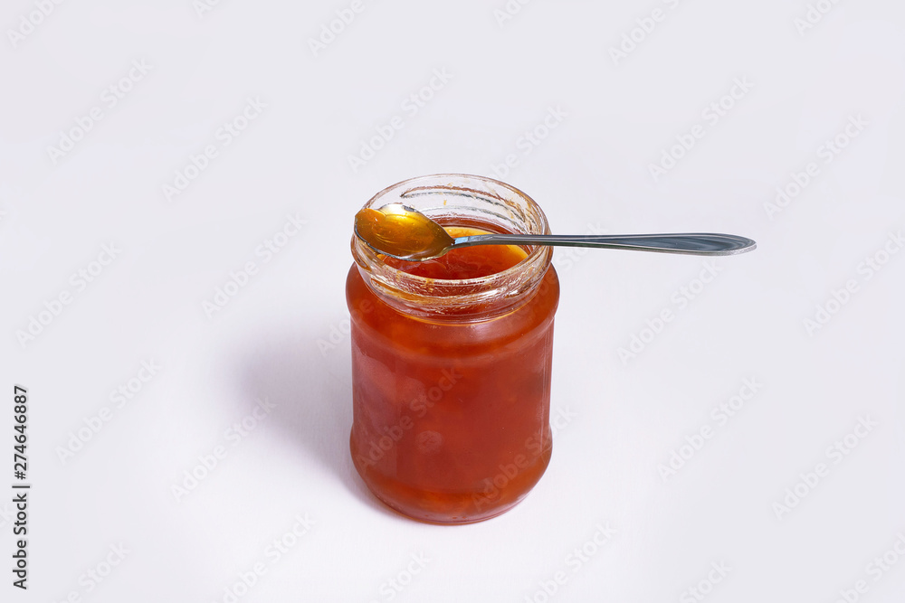 jam in glass jar isolated on white jam in glass jar isolated on white