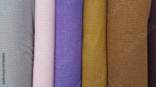 stack of colorful fabrics