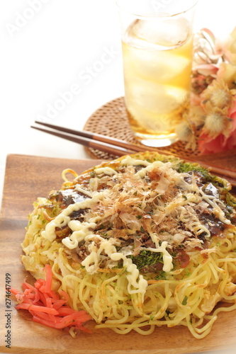 Japanese food, noodles pancake Okonomiyaki photo