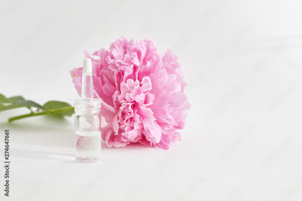 Obraz premium Improving cosmetic procedures. Organic skin care products and flower.