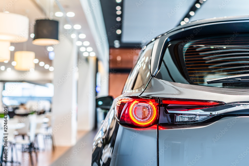Fototapeta premium modern car led tail lights in showroom