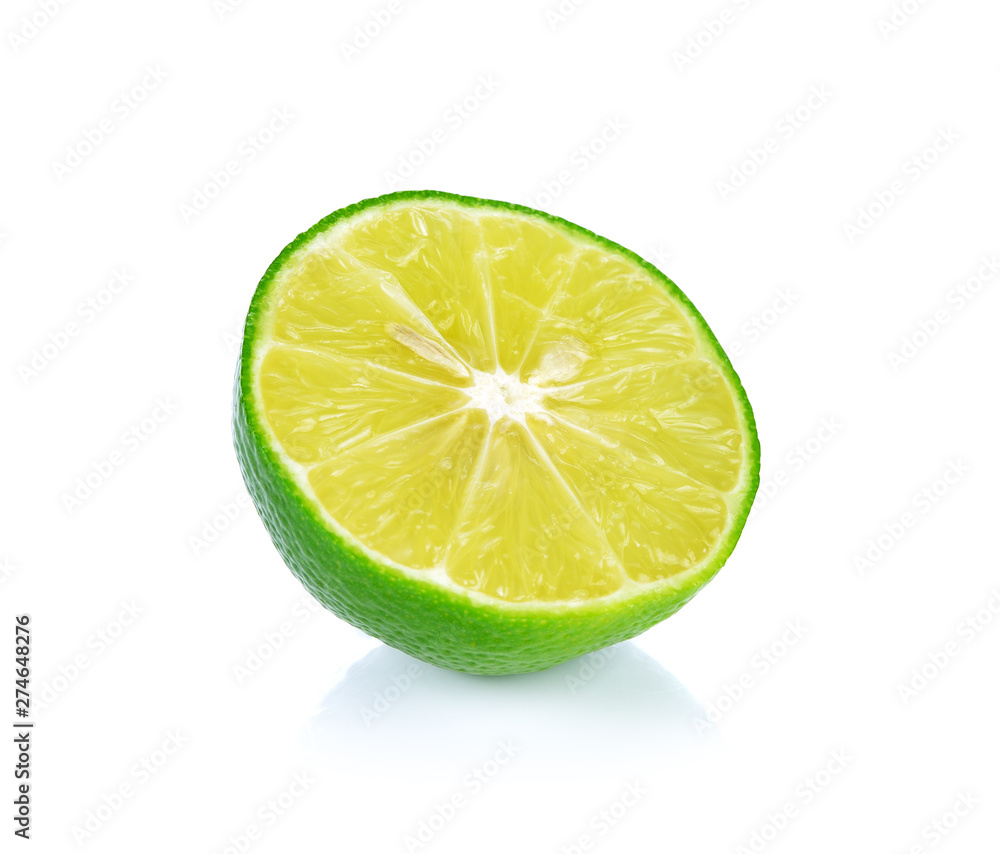 Limes with slices isolated on white background