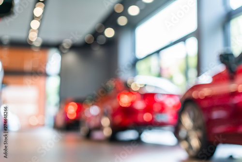 blur view of new modern car in showroom