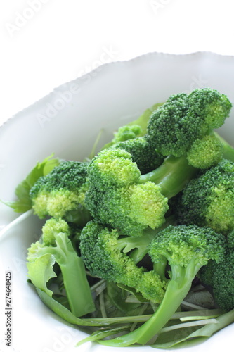 boiled broccoli on white background