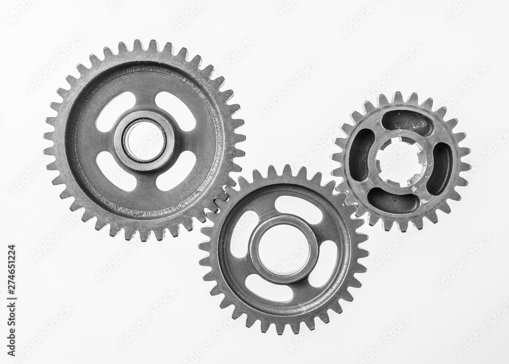 top view of 3 metal gear isolated on white top view of 3 metal gear isolated on white