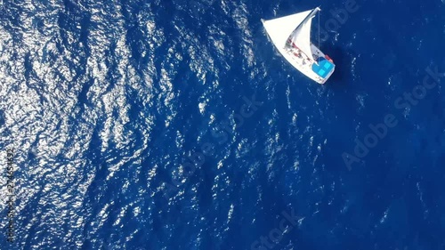 Sunshine Sail Boat Sailing Slowly Off Lucaya Strip Coast, Lucaya, Bahamas photo