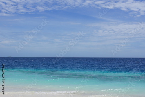 Empty beach in cloudy weather in the Maldives © Talulla