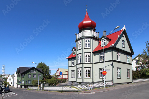 Картината върху платно House with red onion dome in Reykjavik, Iceland (Lake Tjornin district)