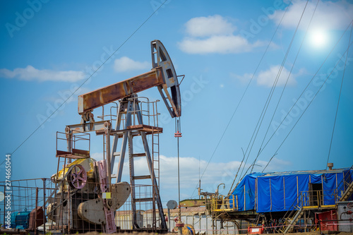 Oil pumpjack, industrial equipment. Rocking machines for power genertion. Extraction of oil.