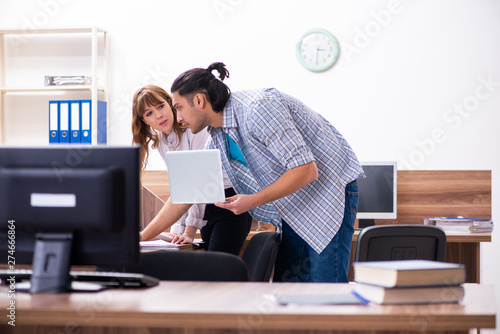 Young male it specialist in the office 