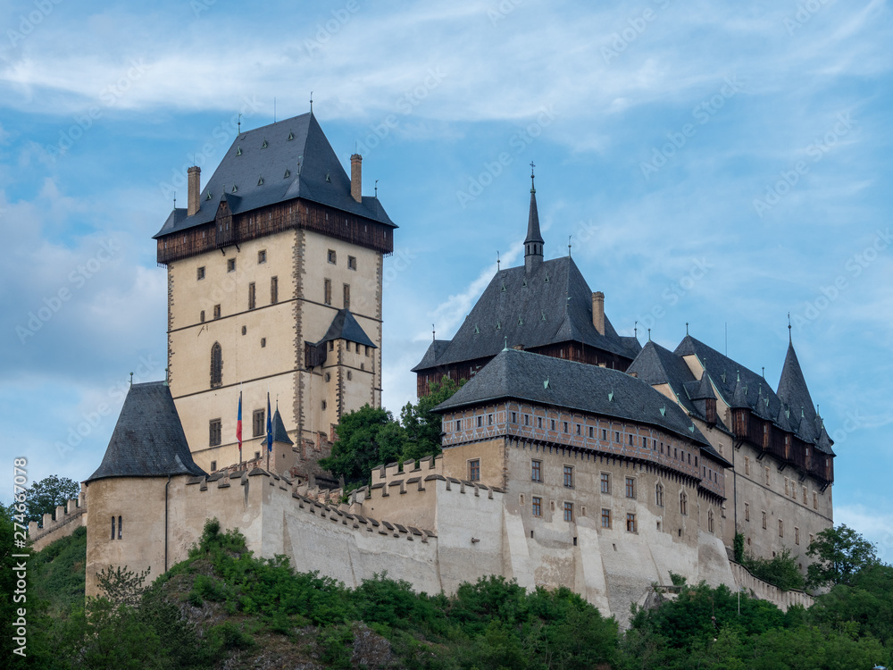 Gothic Karlstejn Castle in Bohemia Czech Republic, a Medieval Fortress buildt by Charles IV in Central Europe on a Sunny Summer Day.