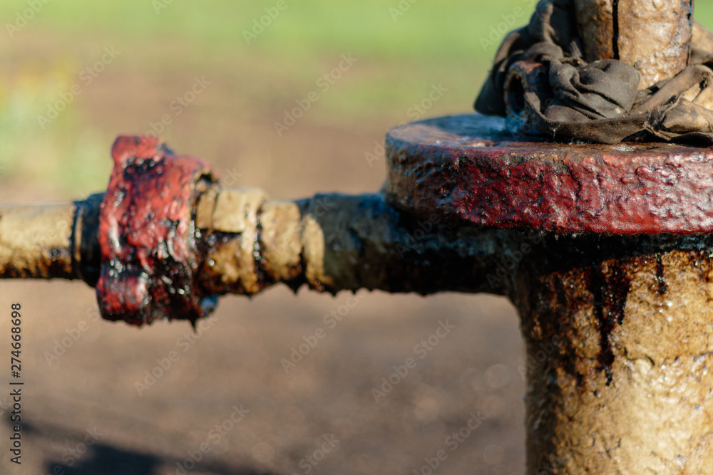 Fototapeta premium Oil, gas industry. Group wellheads and valve armature