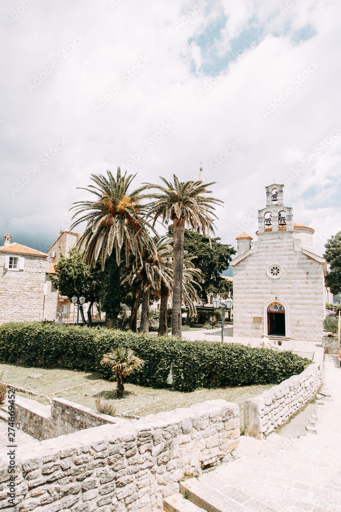 Tourist places and symbols of the coast. Streets of the old town of Budva, Montenegro.