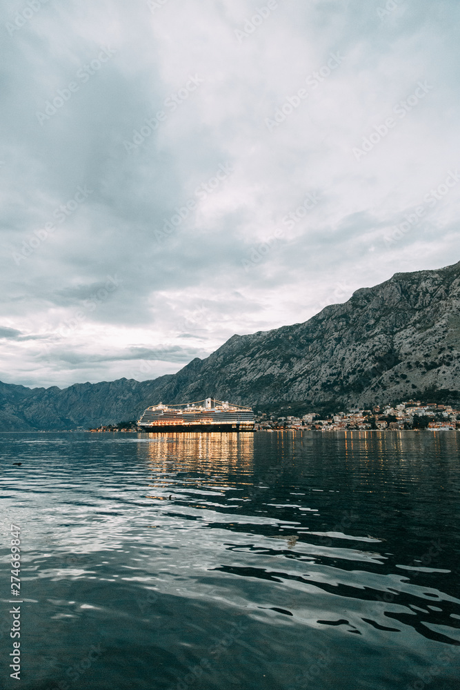 Panoramas of the night city and fortress. Evening Bay of Kotor, Montenegro.