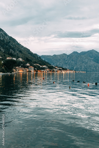 Panoramas of the night city and fortress. Evening Bay of Kotor, Montenegro.