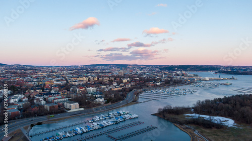 Photography Aerial sunset view on boats in Oslofjord near the e18 highway in Oslo, Norway