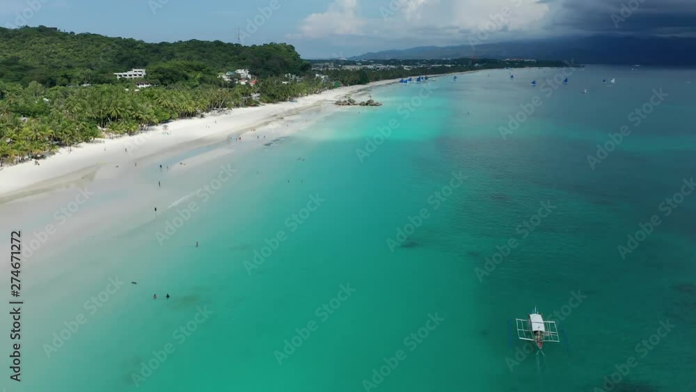 Aerial drone view of a large, beautiful tropical sandy beach (White Beach, Boracay, Philippines) Aerial drone view of a large, beautiful tropical sandy beach (White Beach, Boracay, Philippines)
