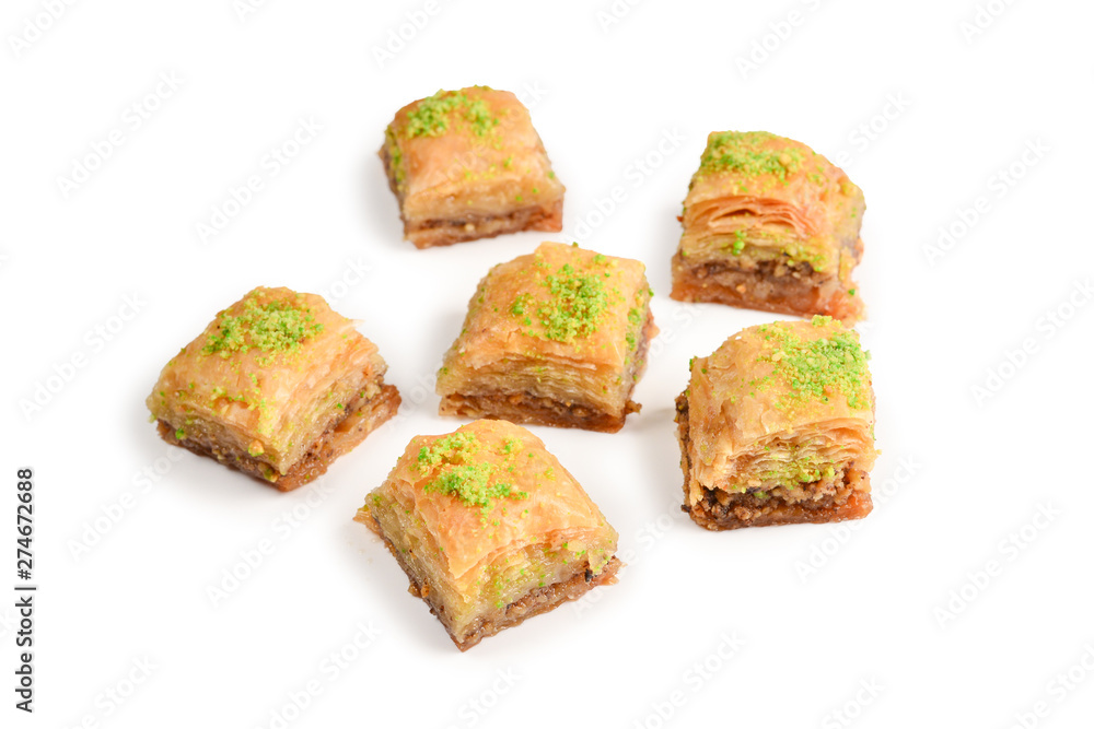 Pistachio baklava on a white background. Dessert.