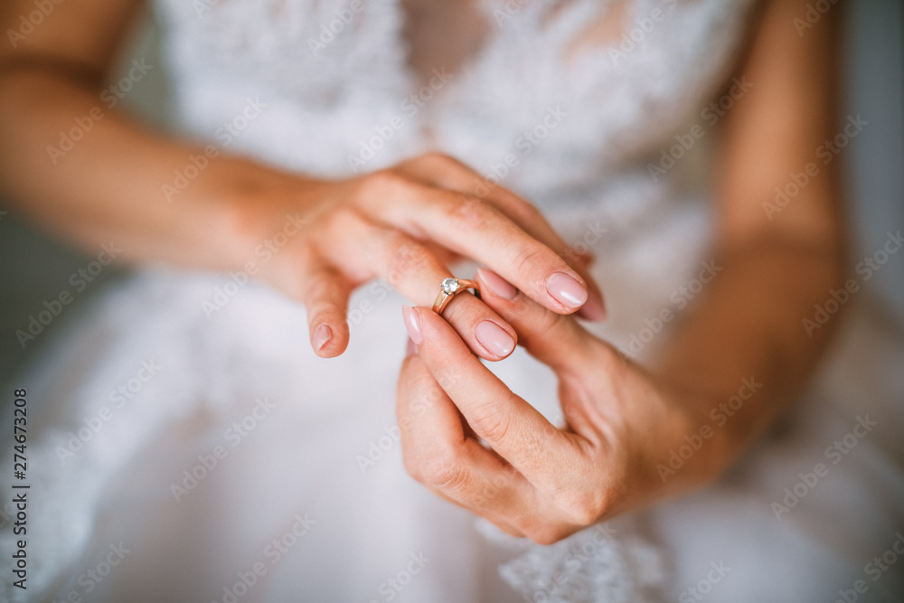 engagement ring in the hands of the bride engagement ring in the hands of the bride