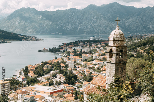  Tiled roofs in Montenegro and Europe. Panorama of the city of Kotor from the height of the mountain.