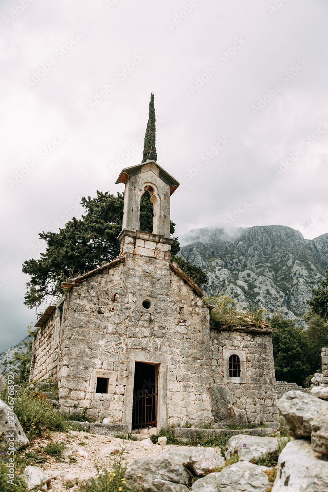 Ancient ruins and stone walls. Old abandoned Church in Kotor, Montenegro. Ancient ruins and stone walls. Old abandoned Church in Kotor, Montenegro.