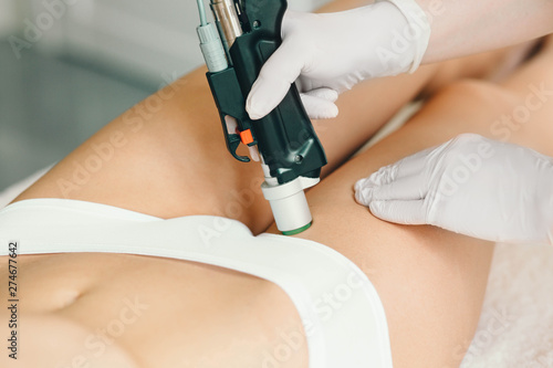 shoot of bikini area while procedure laser hair removing, medical laser close-up