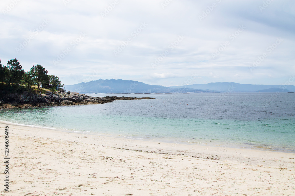 Galicia beach with Cies islands in the background Galicia beach with Cies islands in the background