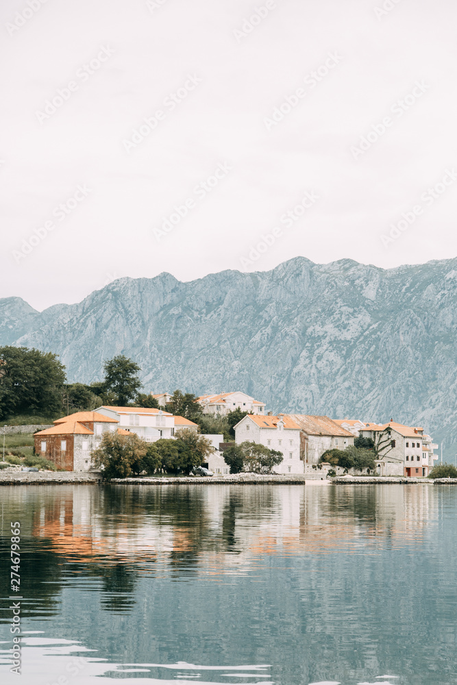 Naklejka premium Attractions and the coastal town of Kotor. Panorama of the Gulf in Montenegro, Kindness.