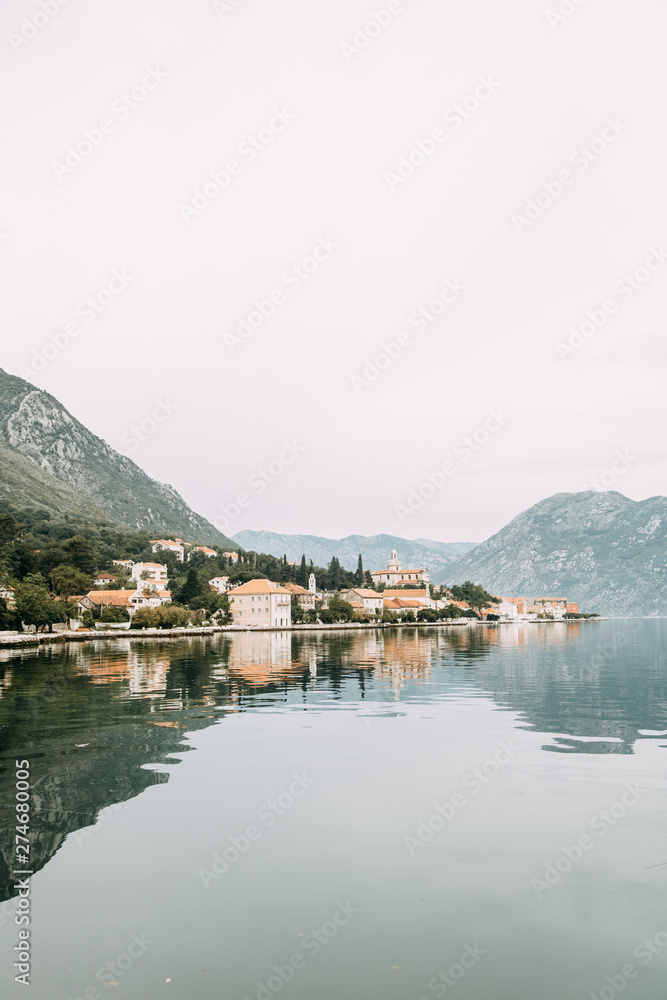 Fototapeta premium Attractions and the coastal town of Kotor. Panorama of the Gulf in Montenegro, Kindness.
