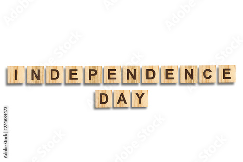Independence Day. The inscription on the wooden blocks. Isolated. Independence Day United States of America background. Festive background.